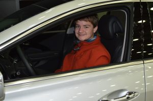 Easton Maryland area student Larsen behind the wheel of Hyundai Azera at the 2017 Motor Trend International Auto Show in Baltimore, Maryland. (Anthony C. Hayes)
