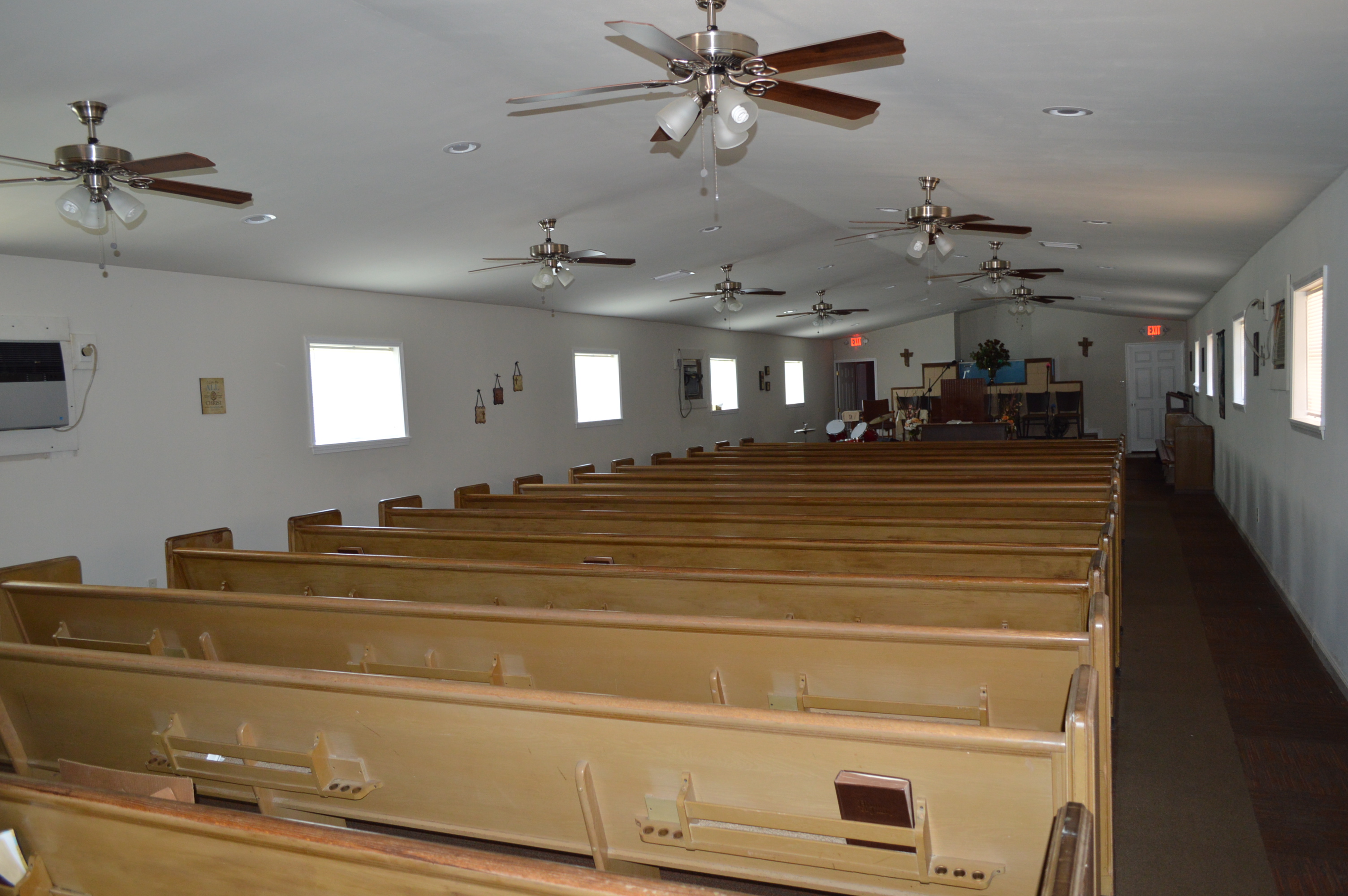 The sanctuary of Disciples of Christ Christian Fellowship Ministry in New Orleans’ Lower Ninth Ward. The pews were donated by the congregation of Salem Church on Staten Island. (Anthony C. Hayes)