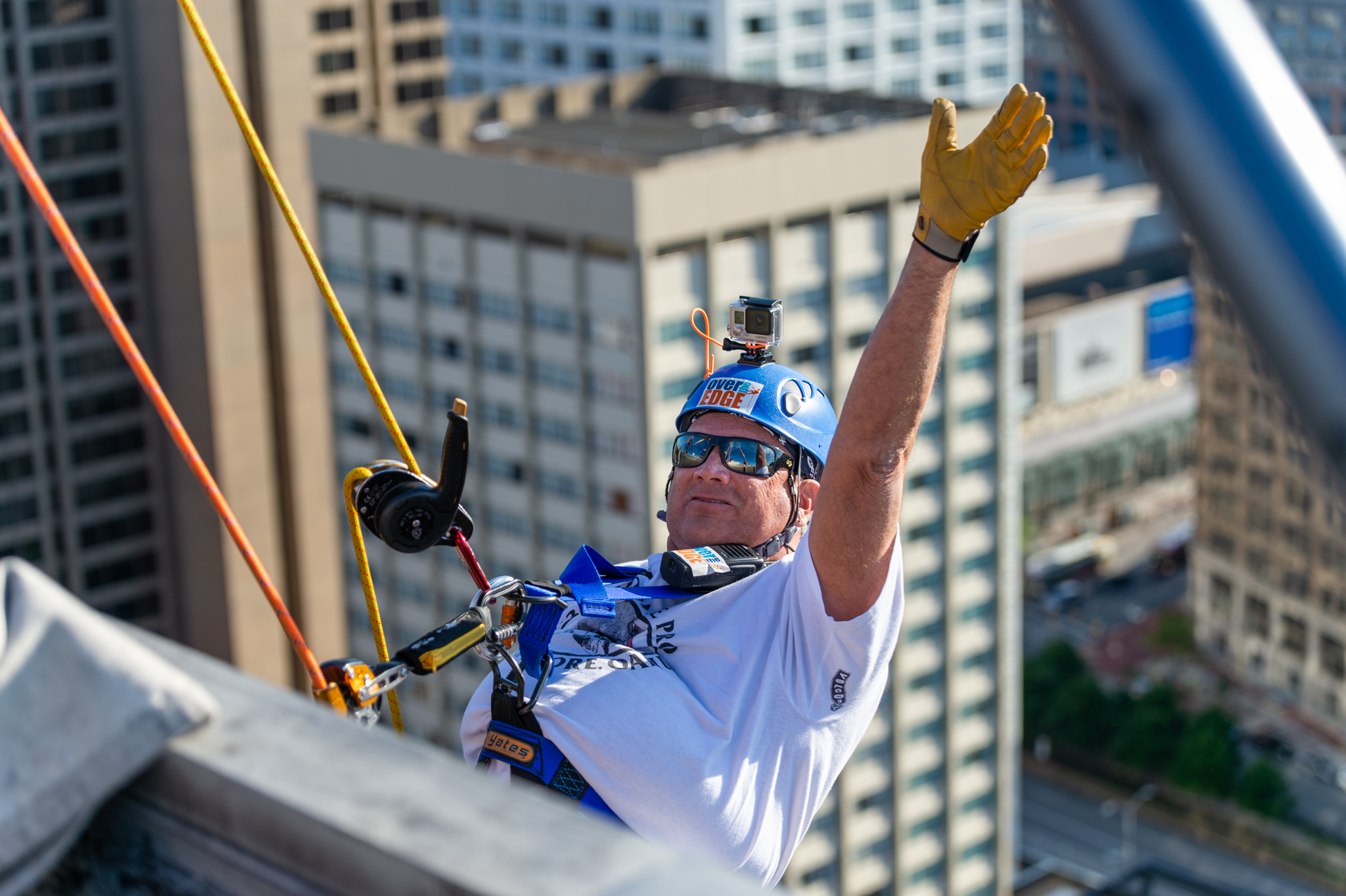 Baltimore, MD - Michael Gerlach of Catonsville begins a 25 story decent down the side of 100 N. Charles Street on Friday June 14, 2019 during the 10th Annual Rappel for Kidney Health event. Gerlach is Executive Producer and Host of ÒInsight on DisabilityÓ radio show on WCBM talk radio AM 680. This is his fifth year going over the edge for the Rappel for Kidney Health event.