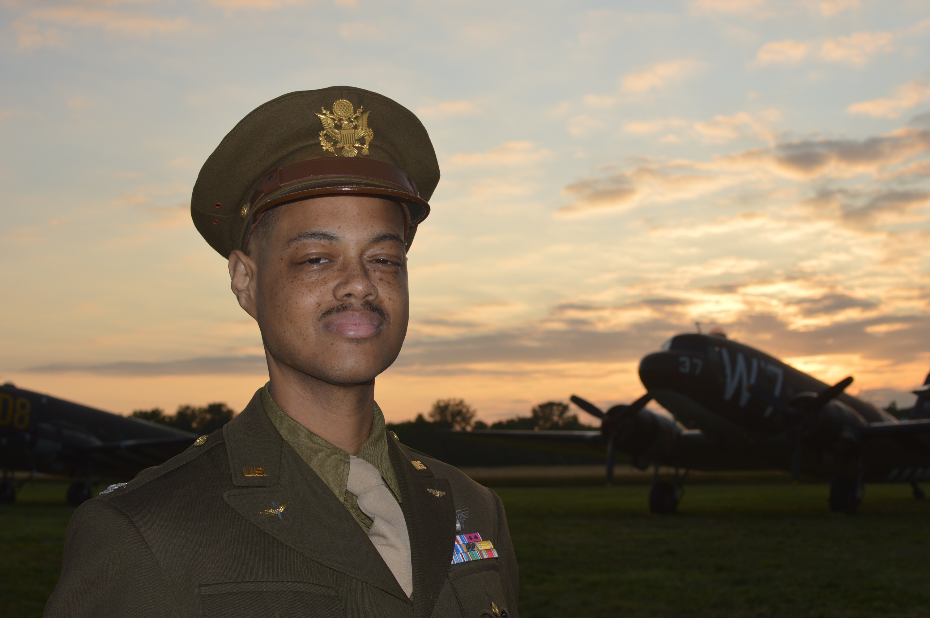 Reenactor/educator Michael Joseph III honoring the Tuskegee Airmen at the National Warplane Museum Airshow. (Anthony C. Hayes)