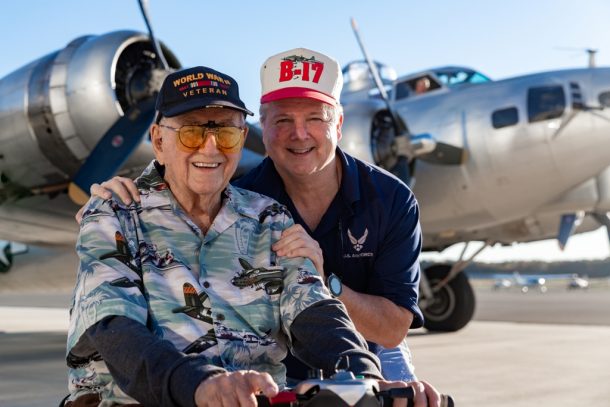 Retired Colonel James C. (“Jimmie Dee”) Dieffenderfer with his son Scott at Manassas Regional Airport in front of the EAA B-17-G Aluminum Overcast (credit Mike Jordan/BPE)