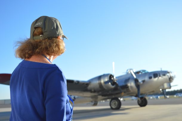 Nancy Solomon, the widow of 43rd Bombardment Group member William "Bill" Solomon looks at the EAA B-17-G Aluminum Overcast. Nancy said she took a ride on the B-17 as a way to honor her late husband Bill. (Anthony C. Hayes)