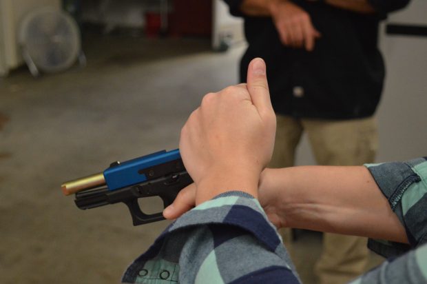 Concealed carry in Maryland: A Maryland Wear and Carry applicant practices with a Glock semi-automatic pistol during a class at Annapolis Defense and Security. (Anthony C. Hayes)
