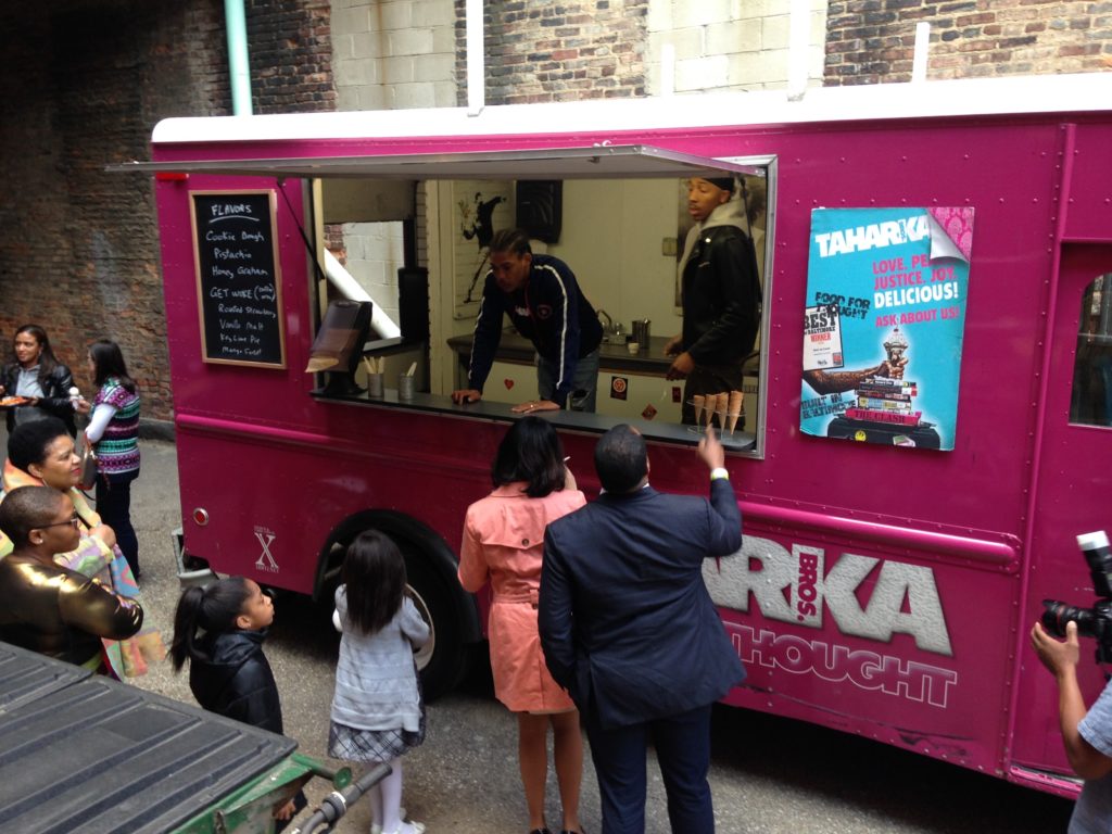 Taharka Brothers uses its ice cream truck — seen here before the days of social distancing — for "ice cream socials," festivals and other events. But now the company is relying on the truck to keep the business afloat during the pandemic by instituting home deliveries, which will supplement the usual grocery-store orders.