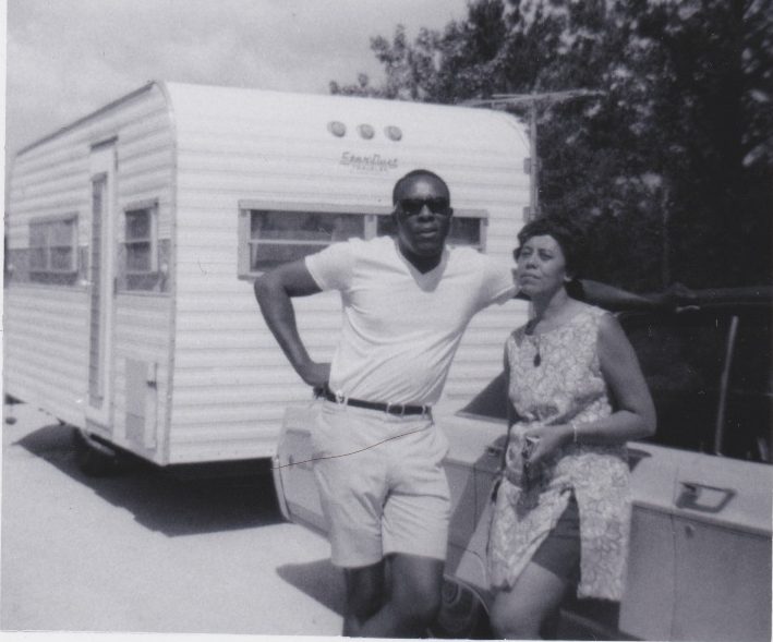 Everyone But Two: Benjamin and Frances Graham in front of their travel trailer