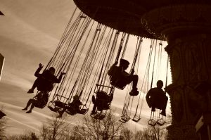 Happy Marylanders brave the December chill aboard the Flying Carousel at Six Flags Holiday in the Park. (credit Anthony C. Hayes/BPE)