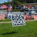 A Biden Sucks yard sign on the lawn of the Trump Store. (credit Anthony C. Hayes)