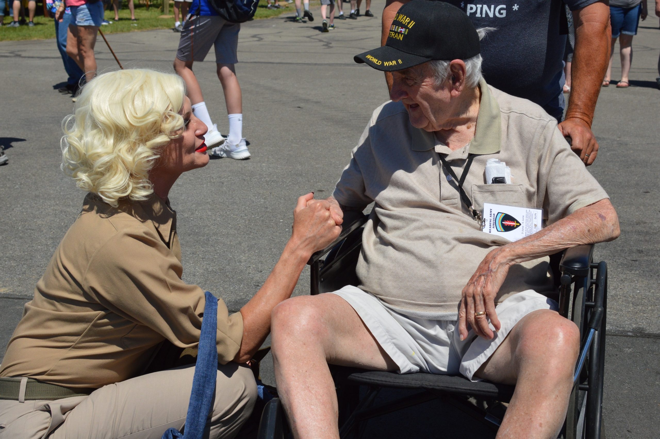 Dietrich actress Cindy Marinangel greets WWII veteran Cecil R. Dorr. (credit Anthony C. Hayes)