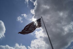 Charlie Kirk, U.S. flag: Image by Bruce Emmerling from Pixabay