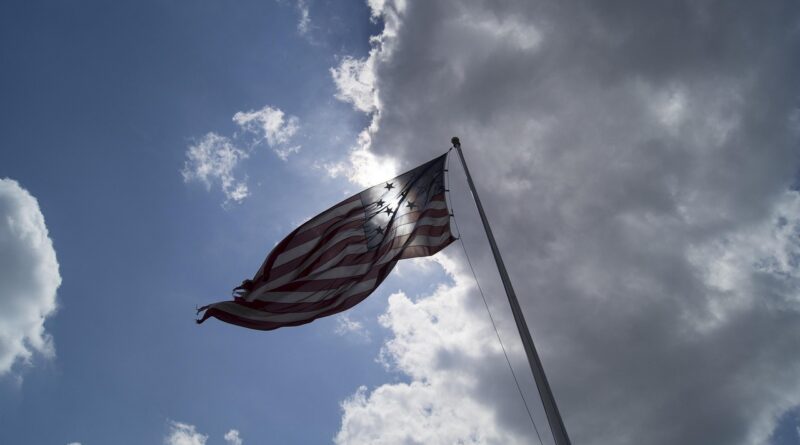 Charlie Kirk, U.S. flag: Image by Bruce Emmerling from Pixabay