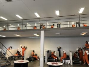 Bringing Hope to Incarcerated Individuals: Photos provided by Good News Global of inmates receiving Hope Packs in 2025.