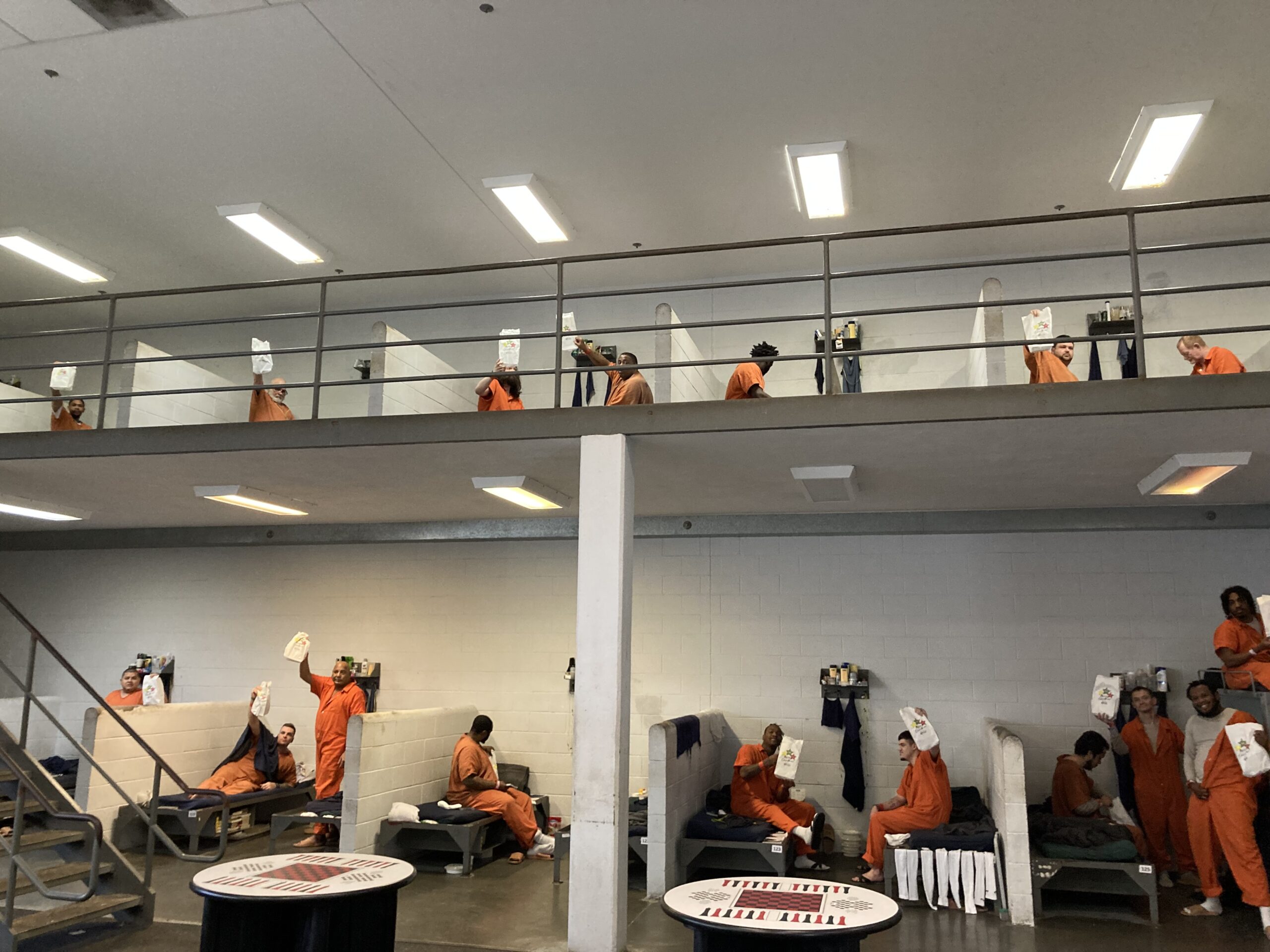 Bringing Hope to Incarcerated Individuals: Photos provided by Good News Global of inmates receiving Hope Packs in 2025.