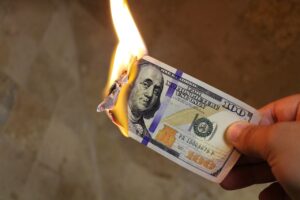 money burning, taxes, income tax: Image by Chris from Pixabay