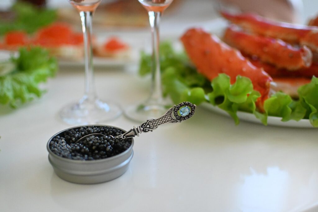 champagne and caviar, The Hunger Code: Image by Iren from Pixabay
