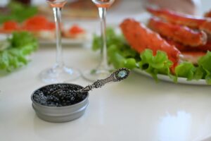 champagne and caviar, The Hunger Code: Image by Iren from Pixabay