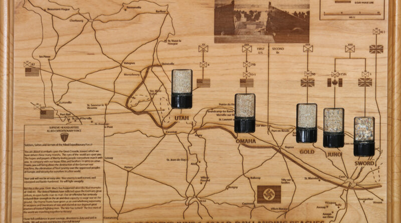 Joel Johnson's D-Day sand plaque by Day of Days Productions.