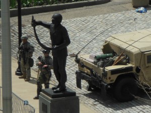 National Guardsmen at positions next to the Negro Soldiers statue in front of Baltiome City Hall. (Anthony C. Hayes)