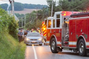 June 12, 2018, Westminster, MD - Max Nickey, President of the newly formed Carroll County Professional Fire Fighters and Paramedics IAFF Local tends to an accident scene on Bachmans Valley Road in Westminster. (BPE Staff Photographer)