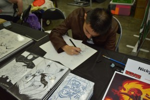 Aspiring artist Nicky Soh at work. (Anthony C. Hayes)