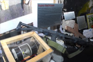A Romak rifle confiscated during the FBI’s 2005 raid on the Virginia Jihad Network, a replica of an explosive used by the Unabomber to hijack a plane and 9/11 rubble from the World Trade Center are all on display at the National Museum of Crime & Punishment in Washington DC. (Larry Luxner)