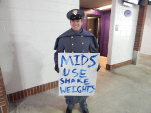 Navy and Army students take pride in making fun of each other throughout the Army-Navy game. (Jon Gallo)