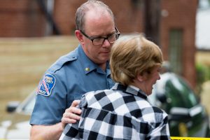 May 28, 2018, Ellicott City, Md. - Howard County Major Jones consoles a business owner during the aftermath of the May 27th storm that produced over 8 inches of rainfall in a very short period of time across Howard County. The downpour caused massive flooding through Ellicott City devastating Main Street homes and business. This flood is reminiscent of the 2016 flood from which the community still haven't fully recovered. (Mike Jordan / BPE)