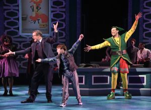 Bobby Smith as Walter Hobbs, Tyler Quentin Smallwood as Michael Hobbs and David Schlumpf as Buddy the Elf in ELF THE MUSICAL at Olney Theatre Center. (Photo: Stan Barouh)