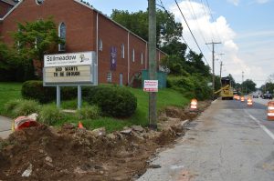 Repair work continues along Frederick Ave. in west Baltimore. The Beechfield community was especially hit hard by the May 27th flooding. SBA disaster assistance loans are available to help homeowners and renters in this stricken community. (Anthony C. Hayes)