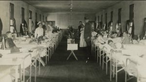 Doctors and nurses tend to injured WWI "doughboys" at U.S. Army General Hospital No. 2 at Ft. McHenry in Baltimore, Maryland.