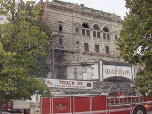 Fire crews arrive on the scene of a fire at the Mayfair Theater. (Anthony C. Hayes)