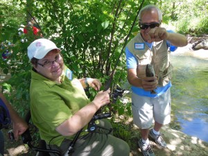 Deb gets a little help from volunteer Mike. (Anthony C. Hayes)