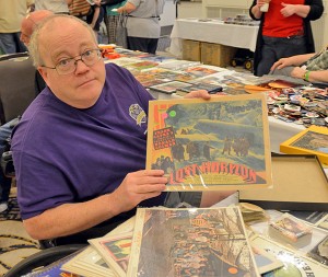 Marty Kircher with one of his movie theatre cards. (Cheryl Fair)