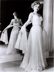 Marilyn Monroe models a Don Loper designed gown.