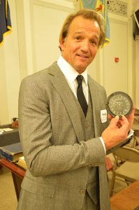 Francis Warrington Gillet III holds the altimeter from his grandfather's Sopwith Dolphin. (Anthony C. Hayes)