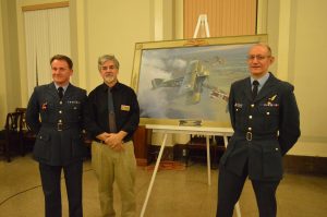 Maryland Over Flanders artist Michael O'Neal (c) is flanked by RAF Wing Commanders Nev Clayton and Clive Mitchell. (Anthony C. Hayes)