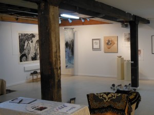 Wooden post and beam construction is evident in the gallery's converted arabber stable.