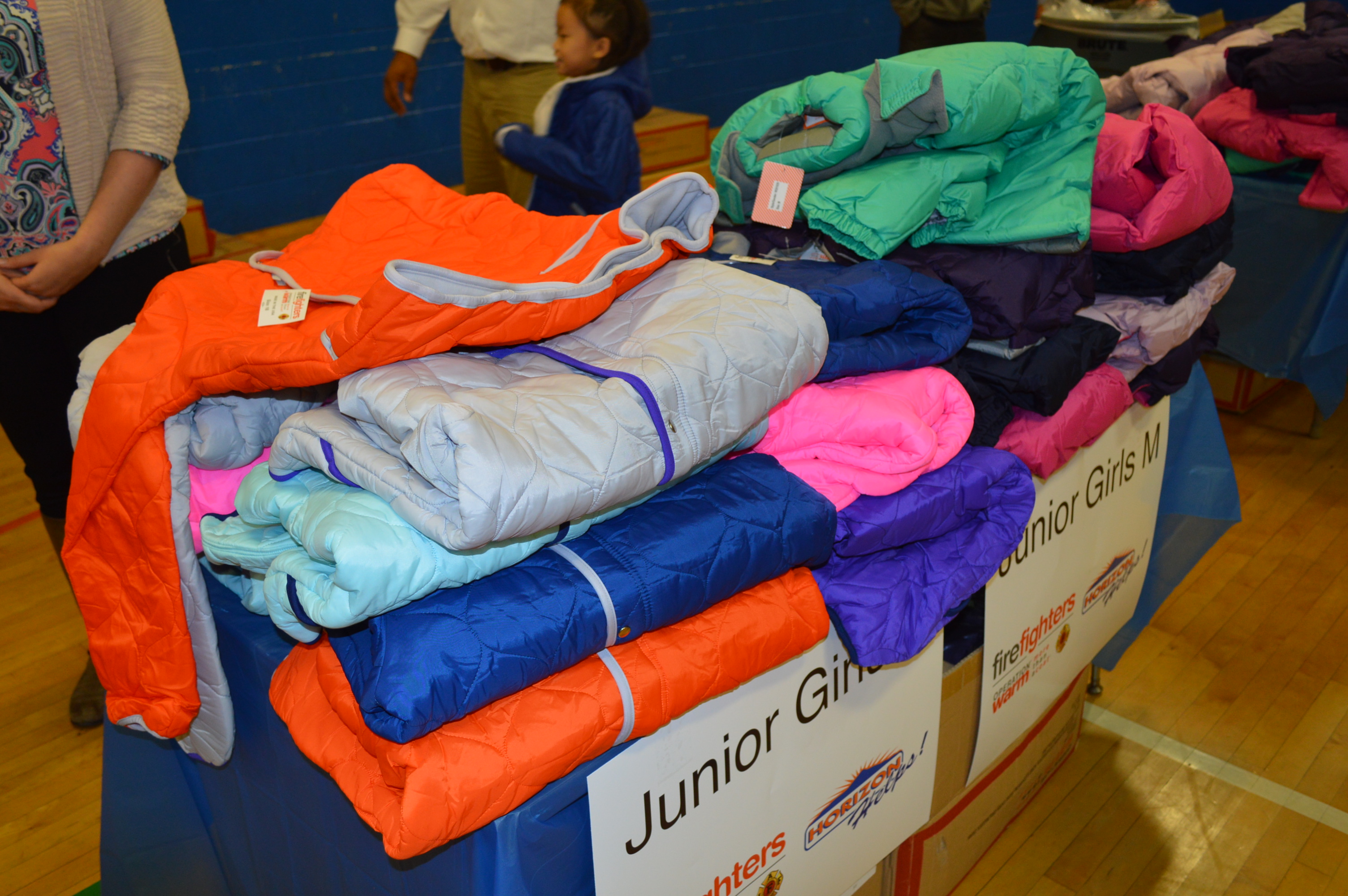 Operation Warm distributed coats to children at Morrell Park Elementary School in Baltimore, Maryland. (Anthony C. Hayes)