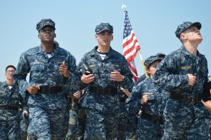 US Naval Academy plebes race accross the Naval Academy Bridge in the 2018 Sea Trials. (Anthony C. Hayes)