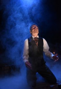 In A Christmas Carol at Olney Theatre, Paul Morrella channels Scrooge in tortured moment from one his ghostly encounters. (Stan Barouh)