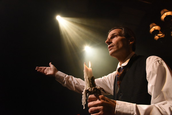 Paul Morella as the narrator in a one man production of A Christmas Carol at Olney Theatre. (Stan Barouh)