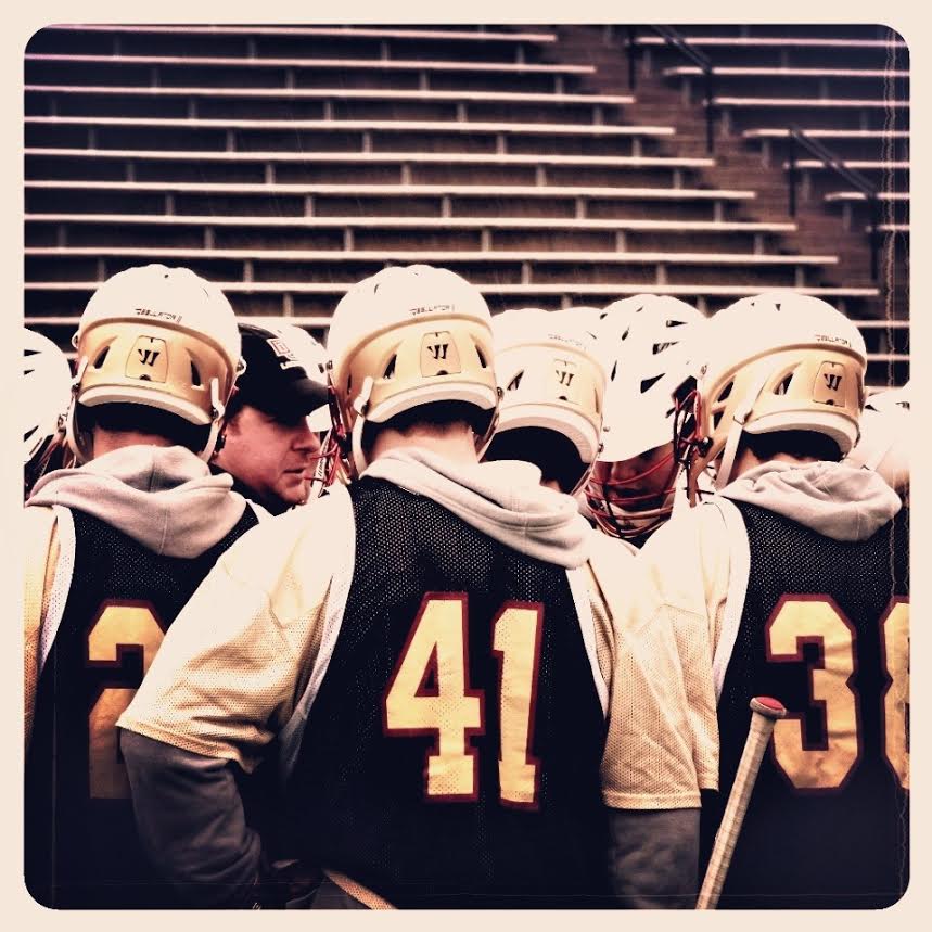 Assistant Matt Brown instructs DU during a break (T. Flynn)