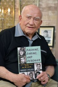 Ed Asner with a copy of Dashing, Daring, and Debonair. (Dan Holm Photography)