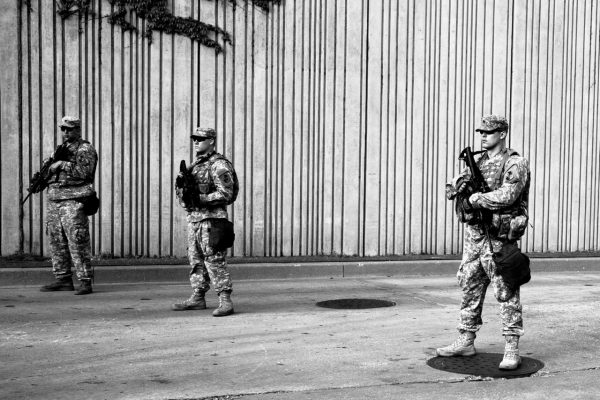National Guardsmen stand at the ready in Baltimore. (Sean Scheidt)