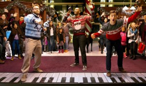 Seth Rogen, Anthony Mackie and Joseph Gordon-Leavitt do their best to recreate Tom Hanks' scene in Big, but their effort isn't good enough. (Sony PIctures)