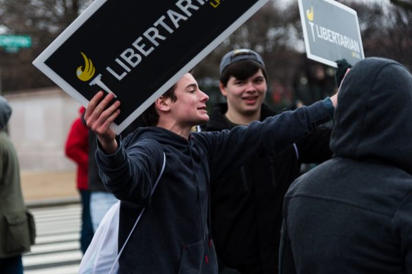 Inauguration Day: A Libertarian yells to a nearby group of protestors. (Michael Jordan)