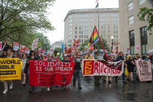 Counter protesters march moments after the lackluster Aug. 12, 2018 "Unite the Right 2" rally in Washington DC. (Mike Jordan/BPE)