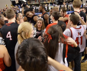 Northeastern's players, cheerleaders and fans reveled in the Huskies' first berth in the NCAA Tournament in 24 years. (Costa Swanson)