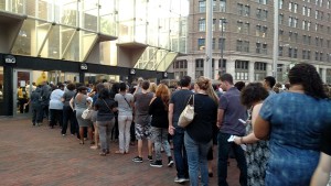 The thousands of fans who attended Prince's Rally 4 Peace concert on Sunday night were checked with a metal detector. Prince asked fans to wear gray in respect to Freddie Gray who died a week after sustaining an injury while in police custody. Six police officers have been charged in connection with his death. (Jon Gallo)